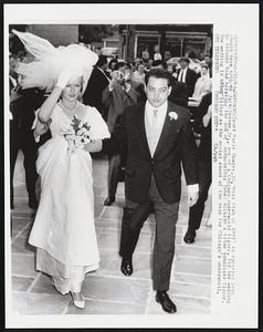 Janet Marie Hawley, 22, “Miss Utah of 1961” is escorted into church here 6/10 by Jack Cerone, Jr., son of a Chicago underworld figure, for her wedding to Anthony Ross Accardo, the son of Anthony (Big Tuna) Accardo a crime syndicate figure. The wedding is being billed as the social event of the year for Chicago’s underworld.