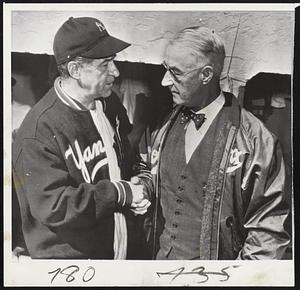 The Men who Came Back and, in the first year took their teams into the World Series. At the left is Stanley (Bucky) Harris of the New York Yankees and at the right is Burt Shotton of the Brooklyn Dodgers.