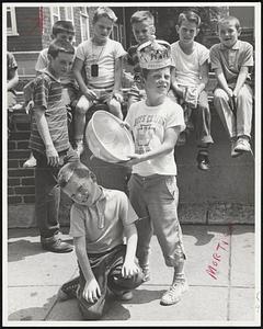 Charlestown Boys Club Freckle Contest One of the winners John Wrenn 10, Chsn, displays his winning formula to Michael O'Brien, 8