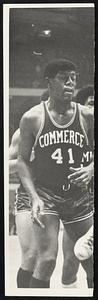 Commerce basketball player