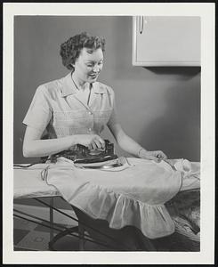 Ironing is easier with a steam-dry iron that operates on a new "flash steam" principle. Empty, the iron weighs only three pounds ten ounces, and for steam ironing it holds as much as seven ounces of water.