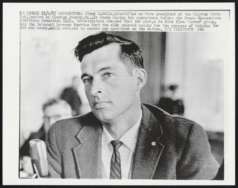 Jimmy W.Wells,identified as vice president of the Clayton Civic lub,located in Clayton County,Ga.,is shown during his appearance before the House Un-American ctivities Committee 11/4. Investigators charged that the club,a Ku Klux Klan “cover” group, old the International Revenue Service that the club existed solely for the purpose of helping the ick and needy. Wells refused to answer any questions on the matter.