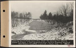 Contract No. 44, Extension of Belchertown-Pelham Highway, New Salem, Orange, looking back from near Sta.1042+40 showing fill before under fill blast, New Salem, Mass., Feb. 7, 1934