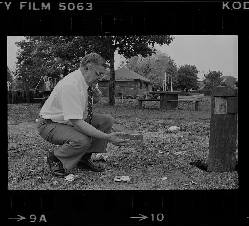 Peter Matthews at playground with litter