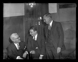 Three unidentified men