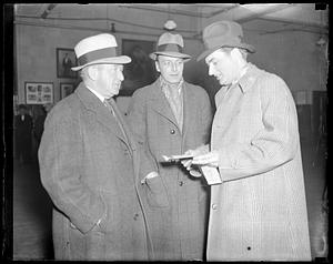Three unidentified men