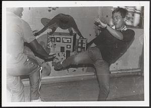 Young man practicing martial arts