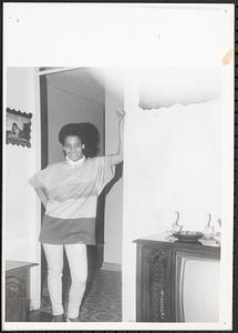 Nodi standing in a doorway