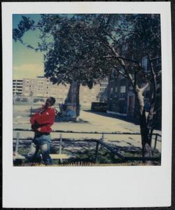 Teenager posing, possibly outside Newtowne Court
