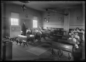 Male teacher inside either Locust Grove, Indian Hill Rd, or Lamberts Cove school (opp. church), WT