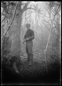 Man with hunting cap - gun
