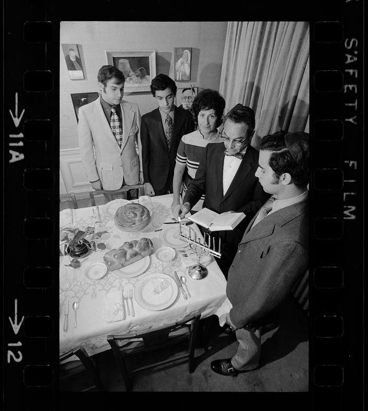 Lensen family lights Hanukkah candles, Brookline Digital Commonwealth