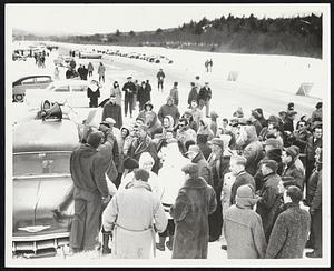 At North Newport, New Hampshire Hardy sports car enthusiasts receive contest instructions from club officials before taking their fast expensive cars around snowy and icy course. All contestants must use safety belts.