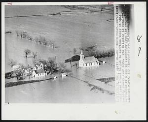 No Church Today--Worshipers would need a boat to get to services today at this country church near here. The building is completely surrounded by a sea of floodwater from the rampaging Missouri river.