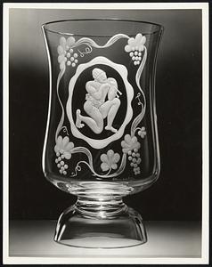 A glass vase with an original design by Henri Matisse included in an exhibition of decorations in glass by twenty-seven world famous artists commissioned by Steuben Glass, Inc., entitled "Twenty-Seven Artists in Crystal".