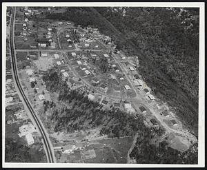 A Neighborhood in Shrewsbury, Hard Hit by the June 9 Tornado is Shown With Homes Once Again Erected.