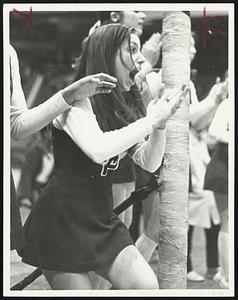 Hyde Park cheerleader captain Gloria Conboy reacts to her team’s winning score during today’s action at the Garden.