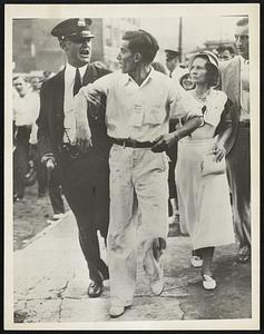 Striker Loses Argument A St. Louis, Mo., policeman is shown escorting a picket at one of the 71 factories in St. Louis, where workers are on strike,. It's not much of a guess to discover what the cop is saying. About 6,000 workers in clothing and hat manufacturing plants are on strike.