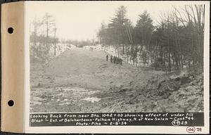 Contract No. 44, Extension of Belchertown-Pelham Highway, New Salem, Orange, looking back from near Sta. 1042+00 showing affect of underfill blast, New Salem, Mass., Feb. 8, 1934