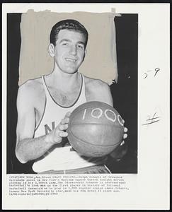 A Grand Feeling -- Dolph Schayes of Syracuse Nationals poses in New York's Madison Square Garden tonight before playing in his 1,000th game. The 34-year-old Schayes is professional basketball's iron man as the first player in history of National Basketball Association to play in 1,000 regular season games. Schayes, former New York University star, made his NBA debut 15 years ago.