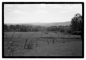 A fence next to a field