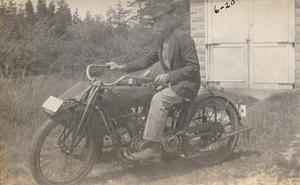 Arthur S. Graham on motorcycle by Cape Cod Laundry Garage, West Yarmouth, Mass.
