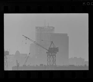 Harbor cargo cranes and downtown office buildings, Boston