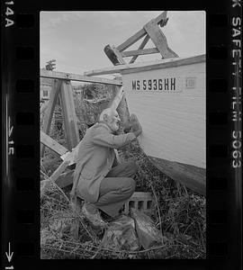 Charlie Powers working on boat