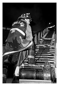 Chelsea firefighter Billy White, L2, manning the controls during a fire