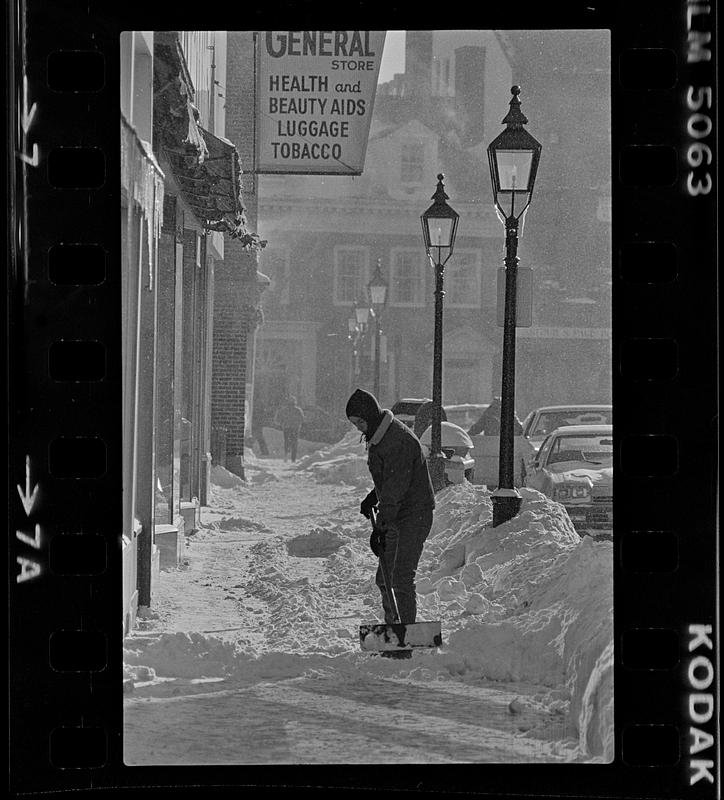 Person shoveling snow