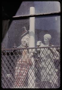 Statues inside of a window