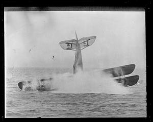 Airplane crashing into water