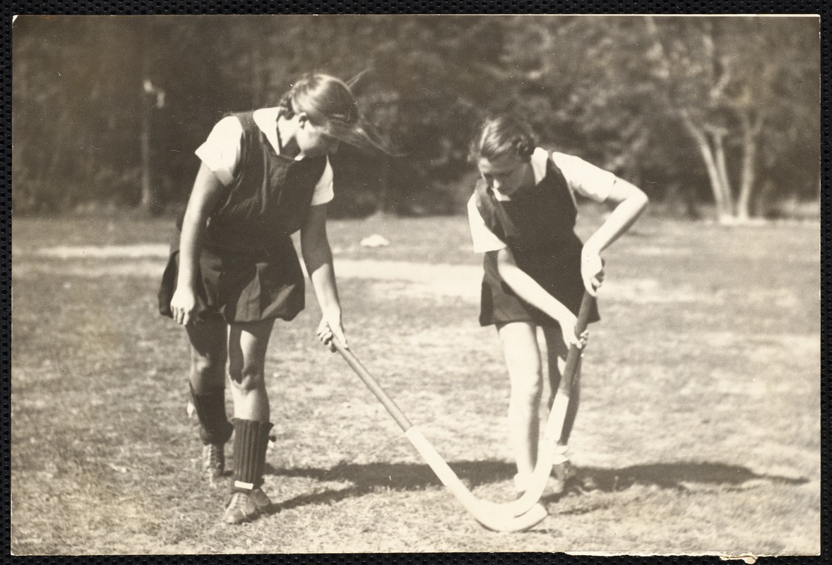 Ellen K. Pernaa, on left and Elaine Cleaves, student head of hockey