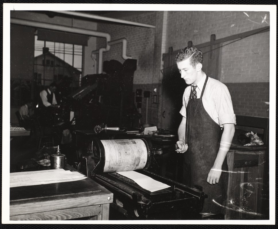 N.Y.A. student aid recipient pulling p[?] in print shop at State Teachers College