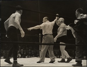 Referee Sonnenberg awards the championship to The Angel. Casey was disqualified for attacking Gus Sonnenberg