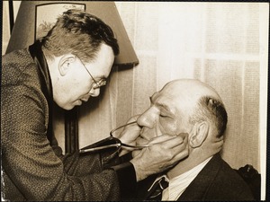 Earnest A. Hooton getting bizygomatic (face breath) palpating (feeling) for the arches