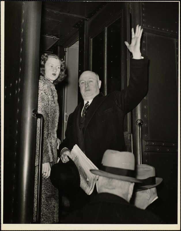 James A. Farley leaving Boston's Back Bay R.R. Station with daughter Peggy for New York