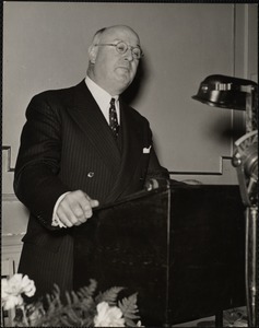 James A. Farley speaking over radio at luncheon giving to him by the Harvard Stamp Club at the Hotel Commander, Cambridge