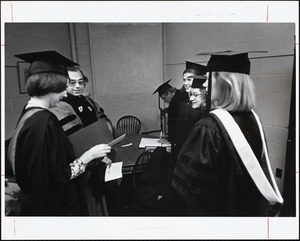 R.A. with Dr. Rosario J. Tosiello, moderator of the faculty; Linda Buchanan '76, president of student government; Alice Eiseman '76, president of student council; Slocumb Hollis Perry '69, president of Alumnae Association; C. Wrede Petersmeyer, chairman of the board, signing register