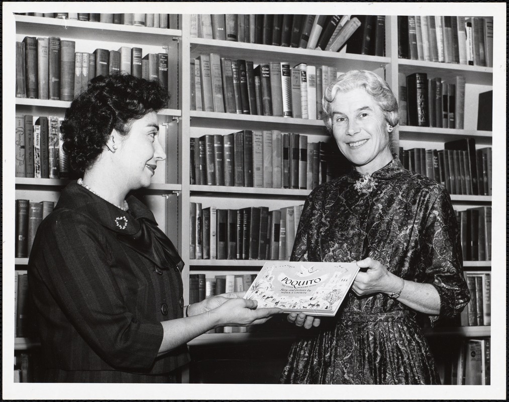 Miss Nora S. Unwin & Miss Helen Paragamian, Pine Manor librarians at book fair, 1959
