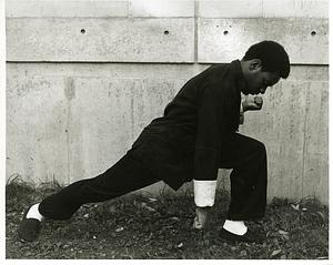 High school student in a martial arts pose