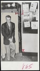 Handcuffed Burton W. Abbott is led out of door at Alameda, Calif. ,Police headquarters after being questioned in death of Stephanie Bryan.