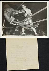 But the Black Boy Won Coleman Raines, Philadelphia, smacked Wallace Gross, East Orange, N.J., through the ropes in the second round of their national junior A.A.U. heavyweight battle at Philadelphia April 18, but Gross climbed back to win a decision.