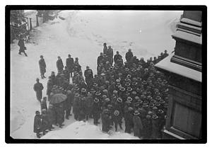 A group of people outside in the snow