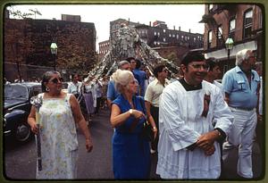 Boston 1981: A priest leads as a statue of St. Anthony carried through the N. End during St. Anthony's Feast in late August