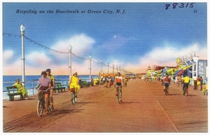 Bicycling on the boardwalk at Ocean City, N. J.
