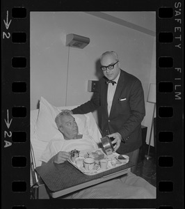 School Supt. William Ohrenberger, stricken while viewing football games, gets okay to enjoy Thanksgiving from brother, Dr. Henry Ohrenberger at Carney Hospital