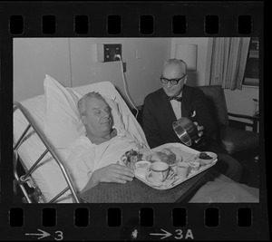 School Supt. William Ohrenberger, stricken while viewing football games, gets okay to enjoy Thanksgiving from brother, Dr. Henry Ohrenberger at Carney Hospital