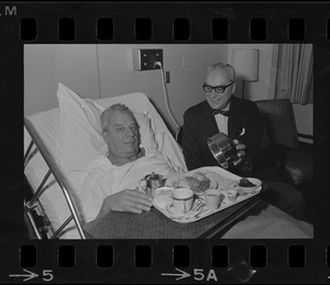 School Supt. William Ohrenberger, stricken while viewing football games, gets okay to enjoy Thanksgiving from brother, Dr. Henry Ohrenberger at Carney Hospital