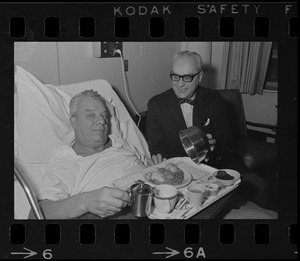 School Supt. William Ohrenberger, stricken while viewing football games, gets okay to enjoy Thanksgiving from brother, Dr. Henry Ohrenberger at Carney Hospital